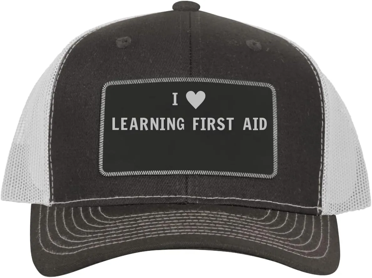 I Heart Love Learning First Aid - Leather Black Patch Engraved Trucker Hat