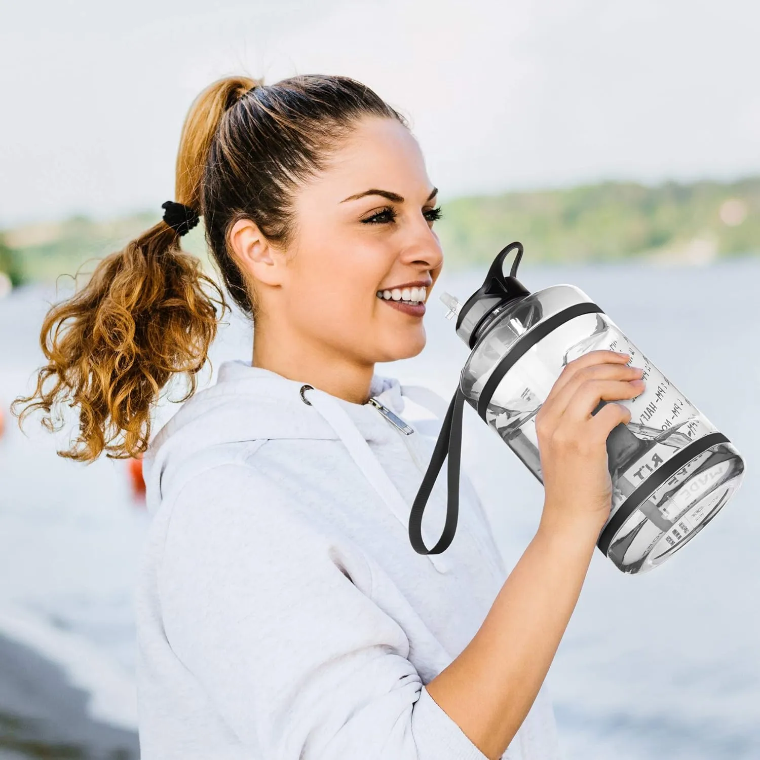 NatureWorks HydroMATE Half Gallon Water Bottle with Time Markers BPA Free Reusable Leak Proof Jug with Straw and Handle 64 oz