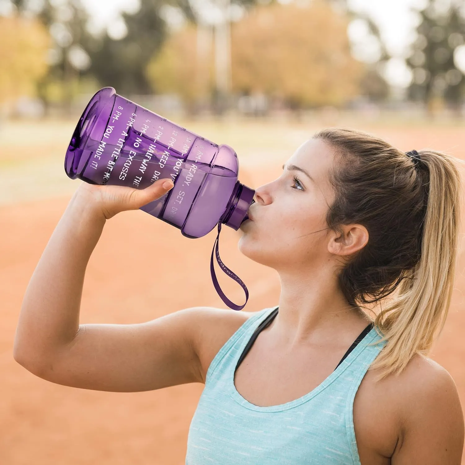 NatureWorks HydroMATE Half Gallon Water Bottle with Times to Drink BPA Free Leak Proof Reusable Jug with Handle 64 oz