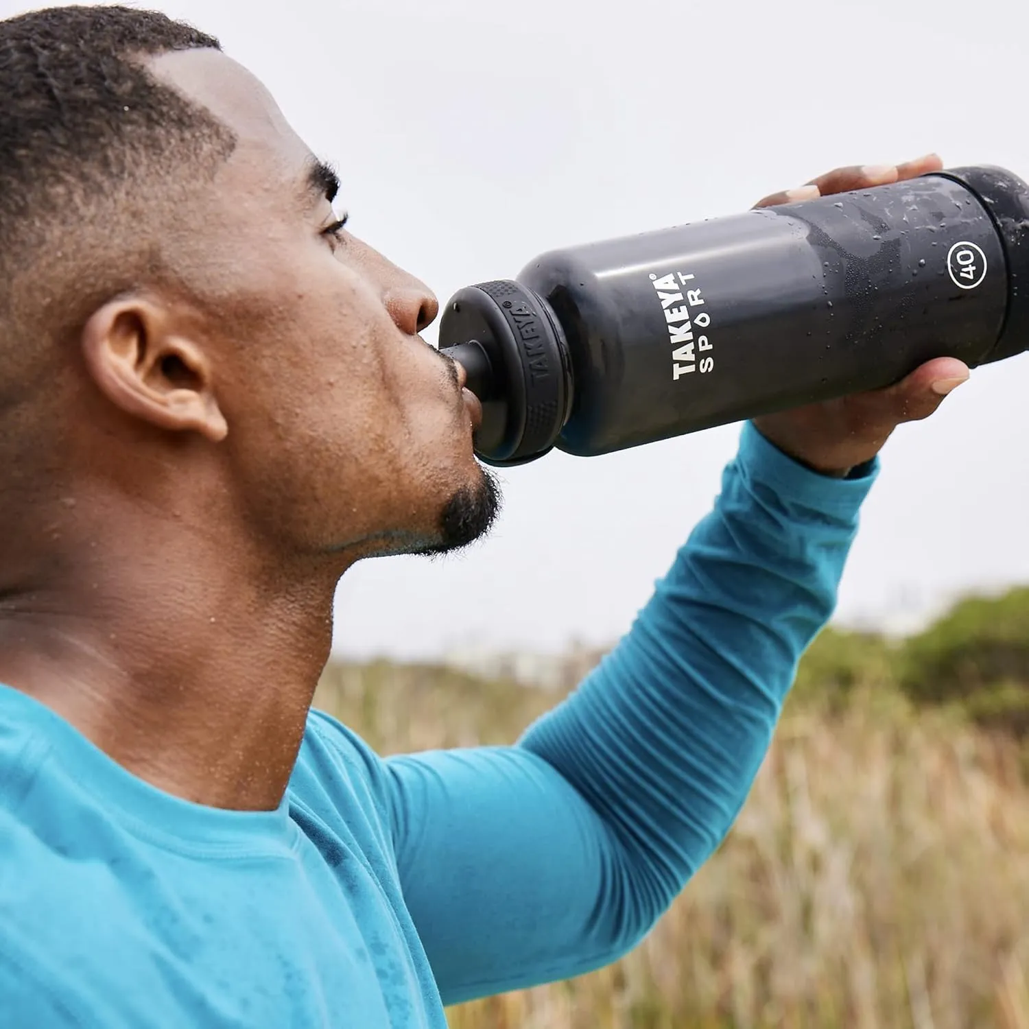 Takeya Tritan Sport Water Bottle with Spout Lid - BPA-Free & Dishwasher-Safe Water Bottle - Reusable Bottle with Lid Handle - Simple Leak-Proof Water Bottle - 40 oz, Extreme Air