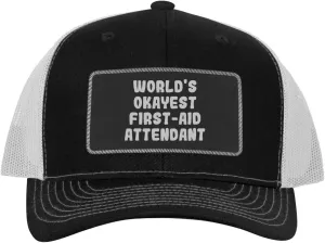 World's Okayest First-Aid Attendant - Leather Black Patch Engraved Trucker Hat